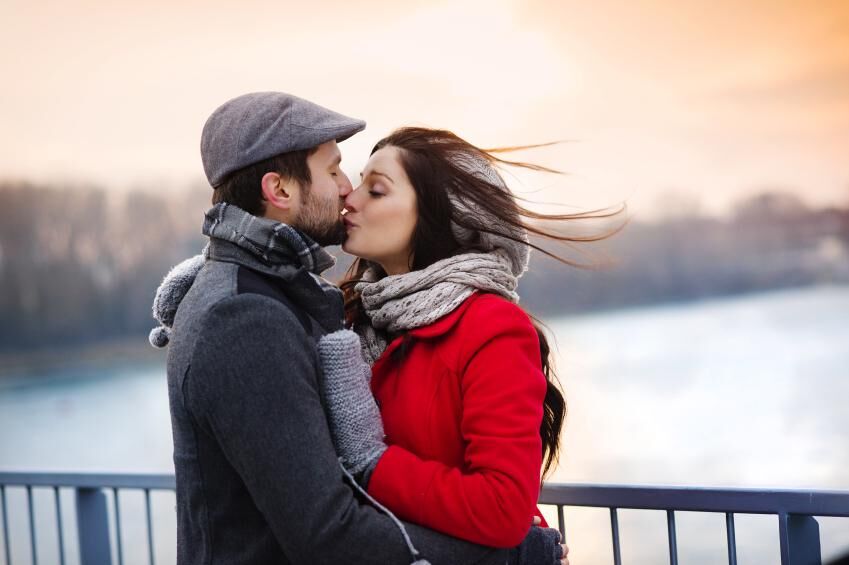 Winter couple kissing