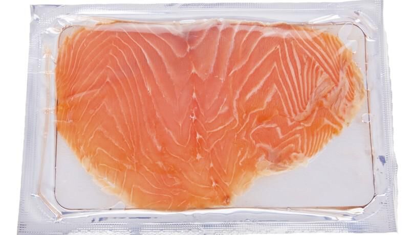 Smoked salmon slices isolated on white background